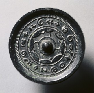 Mirror with Concentric Circles and Linked Arcs
