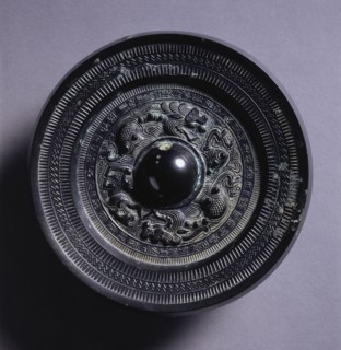 Mirror with Two Dragons and a Tiger, 3rd Century. China, Three Kingdoms (221-280). Bronze;