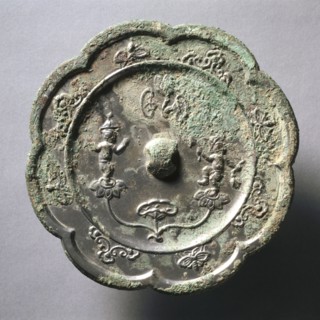 Lobed Mirror with Acrobats on Lotus Blossoms, early 7th Century - early 10th Century. China, Tang