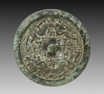 Mirror with Twin Dragons and Lotus Blossoms, 1338. China, Shanxi province, Hezhong, Yuan dynasty
