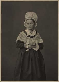 Woman in Lorraine Dress, c. 1860s-70s. Adolphe Braun (French, 1812-1877). Carbon print; paper: 40.8
