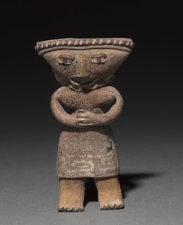 Standing figurine holding an animal (dog?), 300 B.C. to A.D. 300. West Mexico, Colima or Jalisco