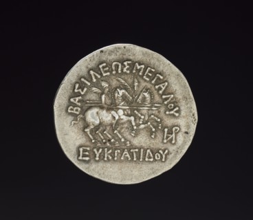 Coin of Eukratides I, 170-145 BC. Afghanistan, Bactria, c. 2nd century BC. Silver; diameter: 3.3 x