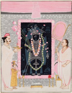 The head priest (Tilakayat) Govardhanlalji makes offerings to Shri Nathji in celebration of the