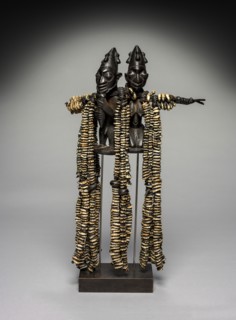 Eshu Dance Staff, 1800s. Guinea Coast, Nigeria, Yoruba people. Wood, leather, cowrie shells; 62 cm