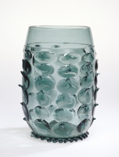 Prunted Beaker; Germany; 16th century; Free-blown dark blue-green glass with applied decoration; 25.2 x 14.4 cm