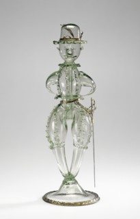 Joke Glass, Scherzgefäss, or Netherlands; 17th century; Free-blown pale green glass with applied decoration; silver