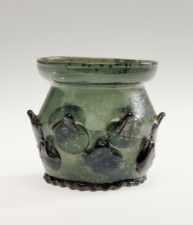 Prunted Beaker, Krautstrunk, Germany; 1480 - 1520; Free-blown dark green glass with applied decoration; 6.2 x 6.4 cm
