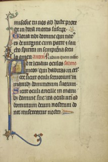 Initial A: A Kneeling Woman Praying to Christ; Northeastern France, France; about 1300; Tempera colors, gold leaf, and ink