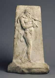 Relief with a Satyr Playing Pipes; Roman Empire; 80 B.C. - A.D. 125; Marble; 50.2 × 31.8 cm, 19 3,4 × 12 1,2 in