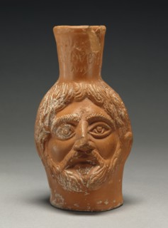 Red-Slip Head Vase; Workshop of Gududio, Roman, active about 300 A.D., North Africa; about 300; Terracotta; 16.3 cm, 6 7,16 in