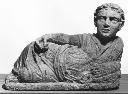 Lid of a Cinerary Urn with a Reclining Figure; Volterra, Etruria; 110 - 80 B.C; Limestone with traces of Polychromy; the surface