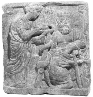Imitation of a Relief of Asklepios and Hygieia; Eastern Mediterranean, ?, 20th century; Hauran basalt; 62.4 x 64.9 x 11 cm, 24