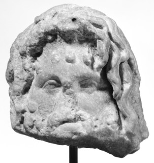 Fragmentary Small Head of Serapis; Egypt; 1st - 2nd century; Marble, crystalline; 9 × 8.5 × 7.5 cm, 3 9,16 × 3 3,8 × 2 15,16 in
