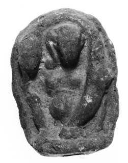 Relief with Grotesque Phallic Figure of Horus; Egypt; 1st - 2nd century; Terracotta, very dark red-brown, 9.5 × 6.8 cm