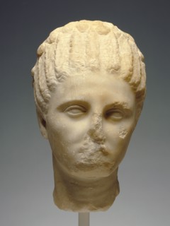 Head of a Woman; Greece; about 320 B.C; Marble; 30.5 × 18.2 × 23 cm, 12 × 7 3,16 × 9 1,16 in
