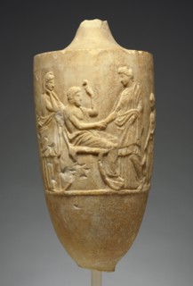 Sculpted Vessel with a Family Scene; Greece, Attica, about 360 B.C; Marble; 56.5 × 25.4 cm, 22 1,4 × 10 in
