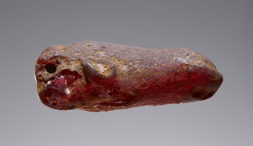 Pendant: Bovine Head; Italy; 500 - 400 B.C; Amber; 35 × 24 × 13 mm, 1 3,8 × 15,16 × 1,2 in