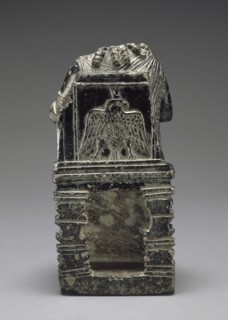 Statuette of Seated Isis with Infant Harpokrates; Egypt; 1st century B.C.–1st century A.D; Steatite; 18 × 8.5 cm