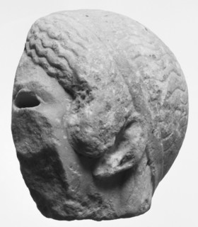 Fragment of a Head from an Acrolithic Statue; South Italy; about 450 B.C; Pentelic? marble; 20 × 20.6 × 9 cm