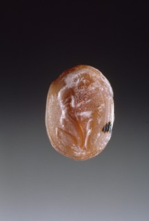 Engraved Scarab; Sphinx and Youth Group II; Greece; late 6th century B.C; Carnelian; 1 x 1.6 x 1.1 cm, 3,8 x 5,8 x 7,16 in