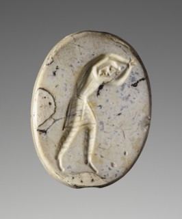 Scaraboid; Pendants Group; about 400 B.C; Mottled grey-white chalcedony; 0.9 × 2.5 × 1.9 cm, 3,8 × 1 × 3,4 in
