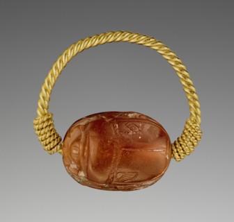 Gem Engraved with a Two-Horse Chariot and Driver; Etruria; 400–300 B.C; Carnelian and gold; 0.8 × 1.5 × 1.2 cm