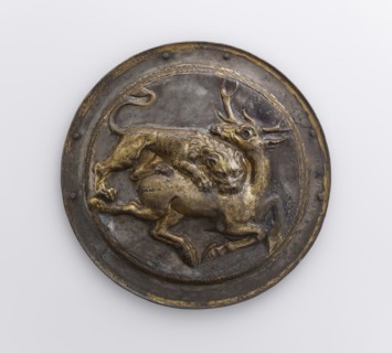 Phalera with Relief of Lion Attacking a Stag; Parthia; 2nd century B.C; Silver with gilding; 9 × 12.6 cm, 3 9,16 × 4 15,16 in