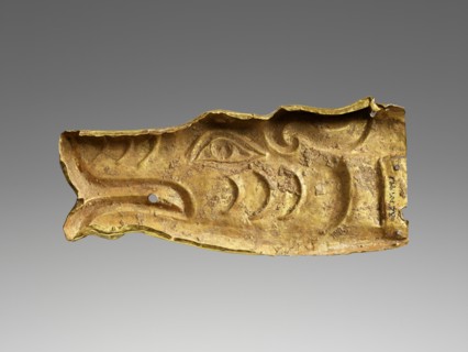 Applique in the shape of a wolf's head; Central Asia; 100 B.C.–A.D. 50; Gold and inlaid stones; 4.9 × 11.4 × 2.5 cm