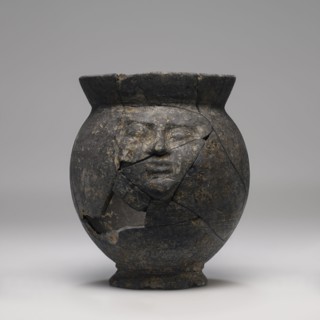 One-Handled Mug with Relief Human Mask; Etruria; 575-550 B.C; Terracotta; 10.5 x 9 cm, 4 1,8 x 3 9,16 in