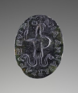 Engraved Gem with Abrasax and a magical inscription; 100 - 250; Green chalcedony; 2 × 1.6 × 0.2 cm, 13,16 × 5,8 × 1,16 in
