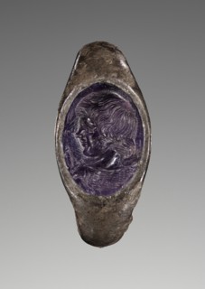 Engraved Gem with the Bust of a Young Satyr inset into a Ring; 1 - 25; Gem: amethyst; ring: silver; 1.3 × 0.9 cm, 1,2 × 3,8 in