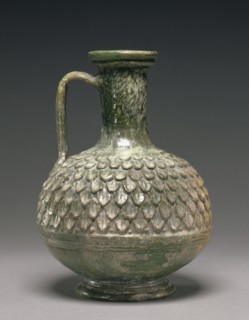 Lead-Glazed Jug; Roman Empire; 50 B.C. - A.D. 50; Terracotta; 15.7 × 4.6 cm, 6 3,16 × 1 13,16 in