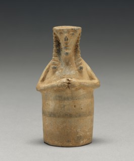 Oil Container in the Shape of a Woman; Crete, Greece; first half of 7th century B.C; Terracotta; 7.6 × 4.1 × 3 cm