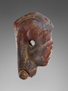 Pendant: Winged Female Head in Profile; Italy; 525 - 480 B.C; Amber; 79 × 49 × 25 mm, 3 1,8 × 1 15,16 × 1 in