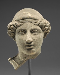 Bust of a Woman; Tarentum, Taras, South Italy; 425 - 350 B.C; Terracotta with clay slip; 16.9 × 13.2 cm, 6 5,8 × 5 3,16 in
