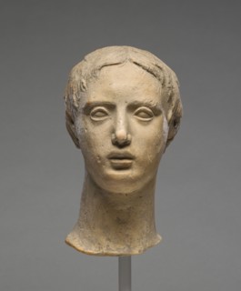 Head of a Youth; Tarentum, Taras, South Italy; 300 - 100 B.C; Terracotta with clay slip; 17.4 × 9.2 × 11.5 cm