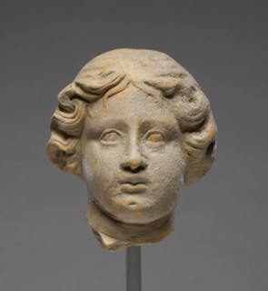 Head of a Woman; Tarentum, Taras, South Italy; 350 - 300 B.C; Terracotta; 12 × 10.3 cm, 4 3,4 × 4 1,16 in