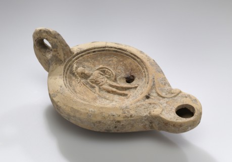 Lamp; North Africa, Tunisia; 1st - 2nd century; Terracotta; 12.2 x 4.9 x 7 cm, 4 13,16 x 1 15,16 x 2 3,4 in