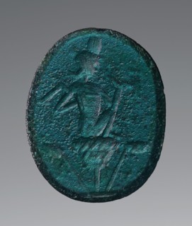 Engraved Gem, Roman Empire; 2nd - 4th century; Greenish-blue glass; 2 × 1.6 cm, 13,16 × 5,8 in