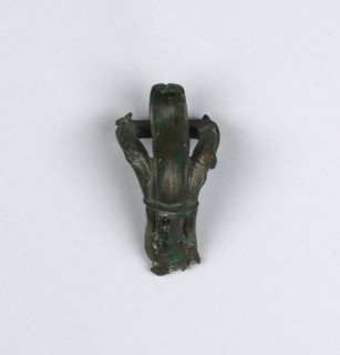 Lamp in the Shape of a Comic Mask; Roman Empire; 75 - 125; Bronze; 6.9 × 12.5 cm, 2 11,16 × 4 15,16 in