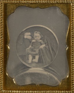 Copy daguerreotype of a circular daguerreotype portrait of a child; American; 1850s; Daguerreotype