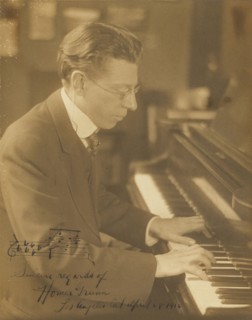 Homer Grunn at the Piano; Louis Fleckenstein, American, 1866 - 1943, 1916; Toned gelatin silver print; 23.5 x 18.5 cm