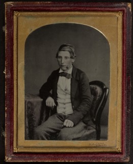 Portrait of a Seated Young Boy; James Valentine, Scottish, 1815 - 1879, about 1860; Ambrotype, hand-colored
