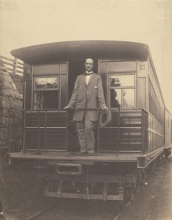 Portrait of an  man standing on rear platform of a train; American; about 1863; Salted paper print; 19.5 x 15.4 cm