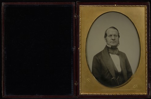 Portrait of an  middle-aged man with muttonchop whiskers, wearing wire-rimmed glasses; Mathew B. Brady American, about 1823