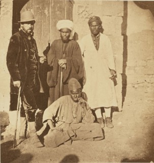 Group portrait of four men; about 1860 - 1880; Tinted Albumen silver print