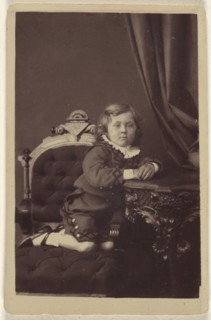 Boy wearing a Fauntleroy suit; about 1869; Carbon print