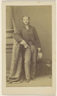 man with moustache & muttonchops, holding gloves in one hand, a hat in the other; F. Schwarzschild, British, active Calcutta