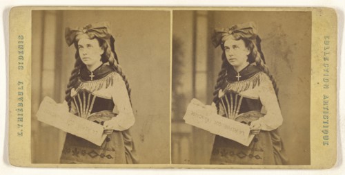 Young woman standing, holding a  La Republique Francaise  newspaper; E. Thiébault French, active Paris, France 1850s - 1870s